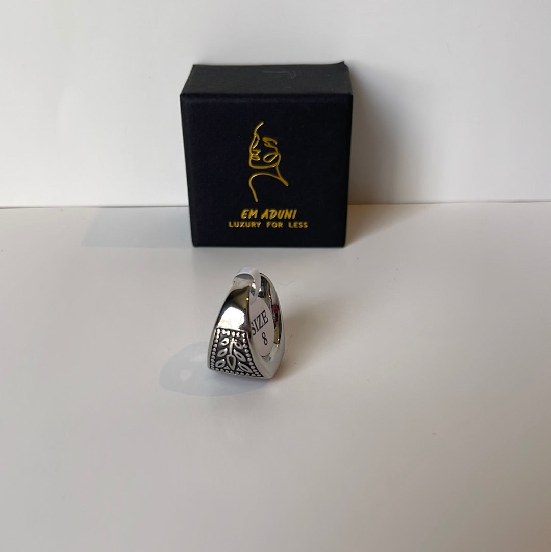 Dark engraved silver red stone